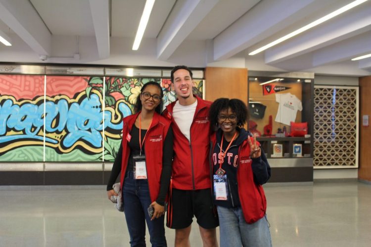 Three students standing in Teraanga Commons